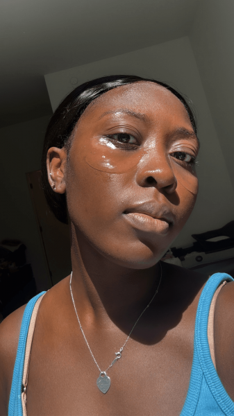 Associate beauty editor Annie BlayTettey wearing the CosRx The Peptide Collagen Hydrogel Eye Patch