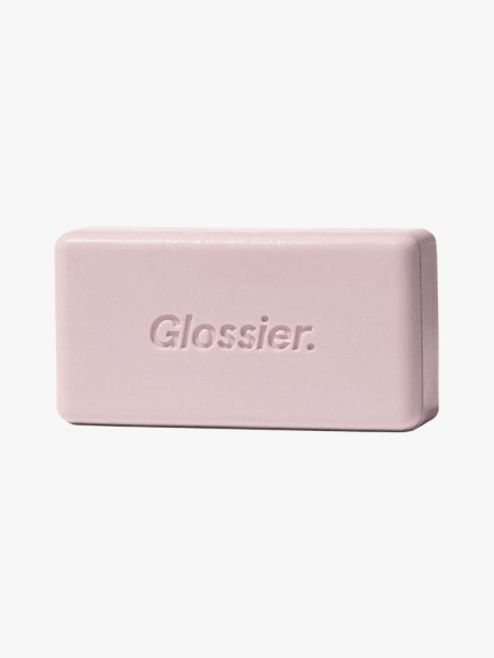Glossier Body Hero Exfoliating Bar in branded component on a light gray background